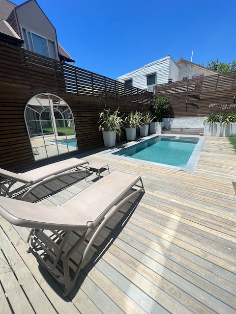 Cozy family home with garden and barbecue.