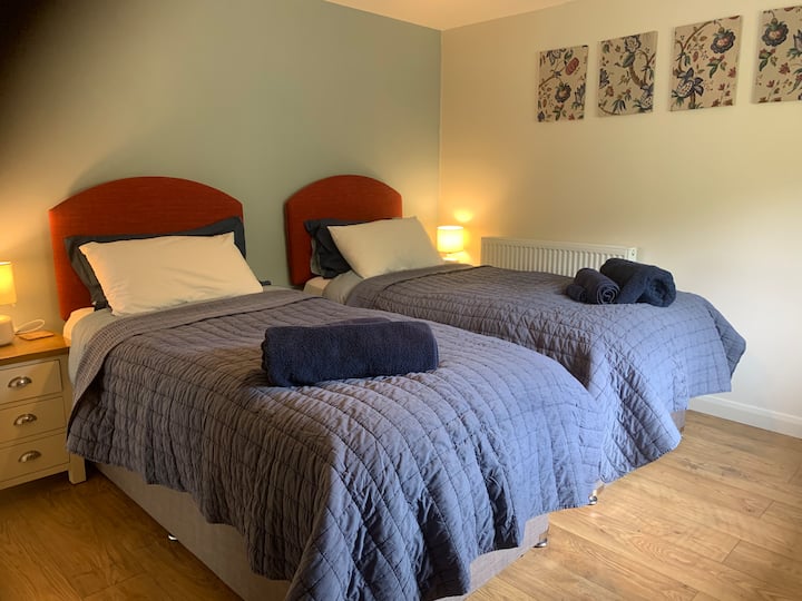 2 single beds that can be zip locked together to provide a superking sized bed. 