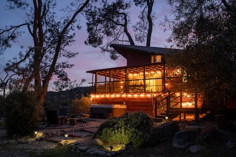 Mid-Century Creekside Cabin with Hot Tub