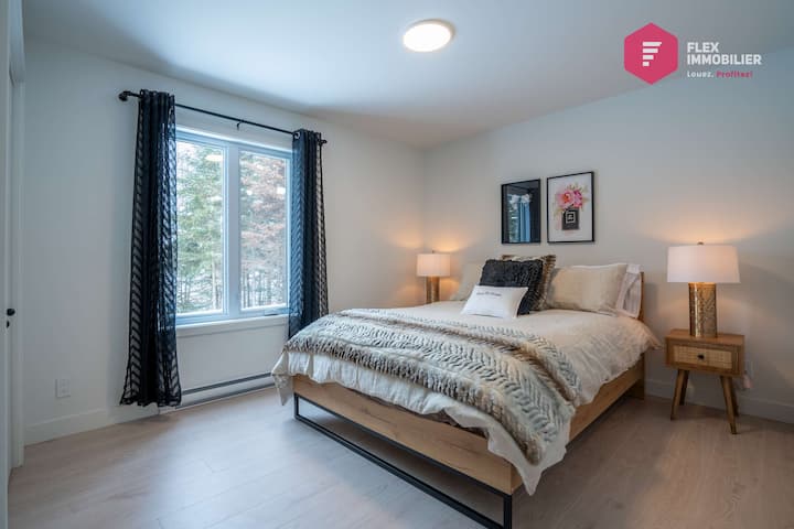 Comfortable bedroom #1 on the ground floor with a queen-size bed