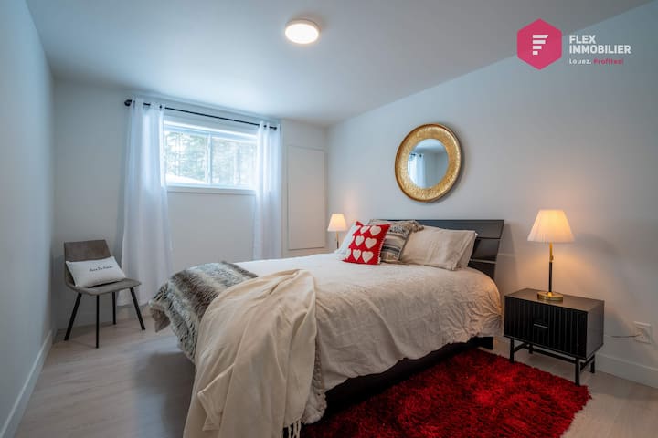 Comfortable bedroom #4 in the basement with queen bed