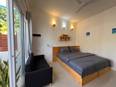 Private Room in Dhigurah with a private patio 1