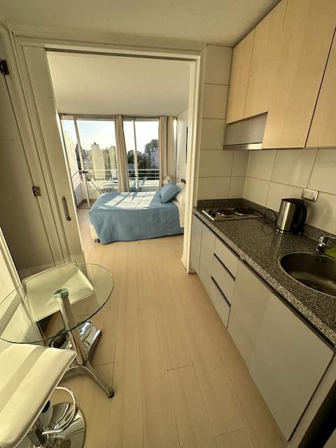 Studio apartment with a pool.
