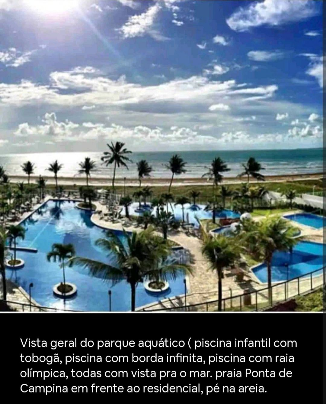 A general view of the aquatic park is presented, featuring several pools including an infinity pool and a children's pool with a waterslide. The image shows Olympic-sized swimming areas, all oriented towards the ocean, with palm trees framing the scene and the beach visible in the background.