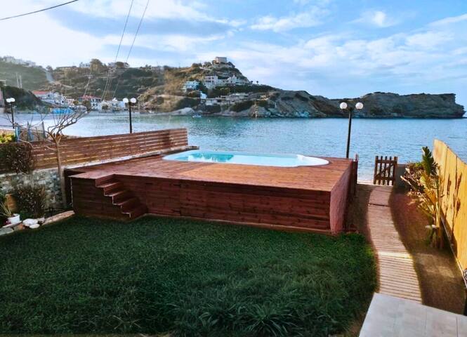 Elegant seafront apartment with private pool & BBQ