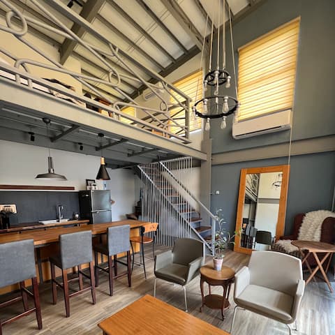 Modern City Loft Above a Cozy Café