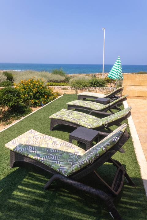 Seafront holiday home surrounded by nature