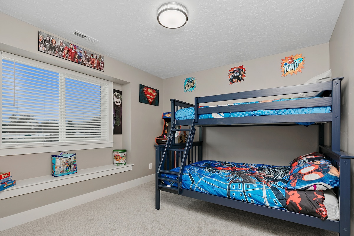 This is the kids room, which has a twin over fool. There’s fun games to play and toys for different ages. Also comes with a full size video arcade.