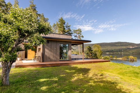 Secluded funkish cabin with beach