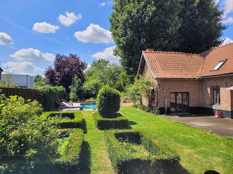 character farmhouse with pool and fireplace