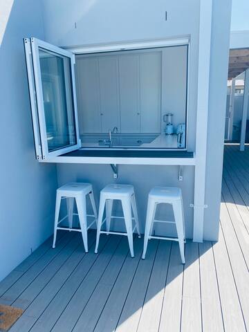 Sun-drenched brand new family home with pool gallery image 3