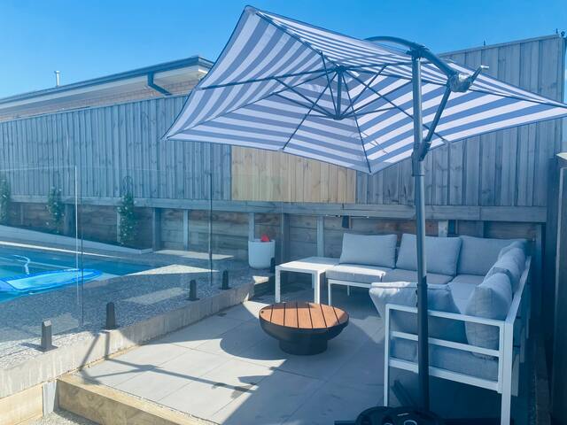 Sun-drenched brand new family home with pool gallery image 4