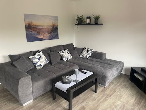 Top performing Airbnb: Vacation home Leo | Dornumersiel | Garden & Wallbox in Dornum