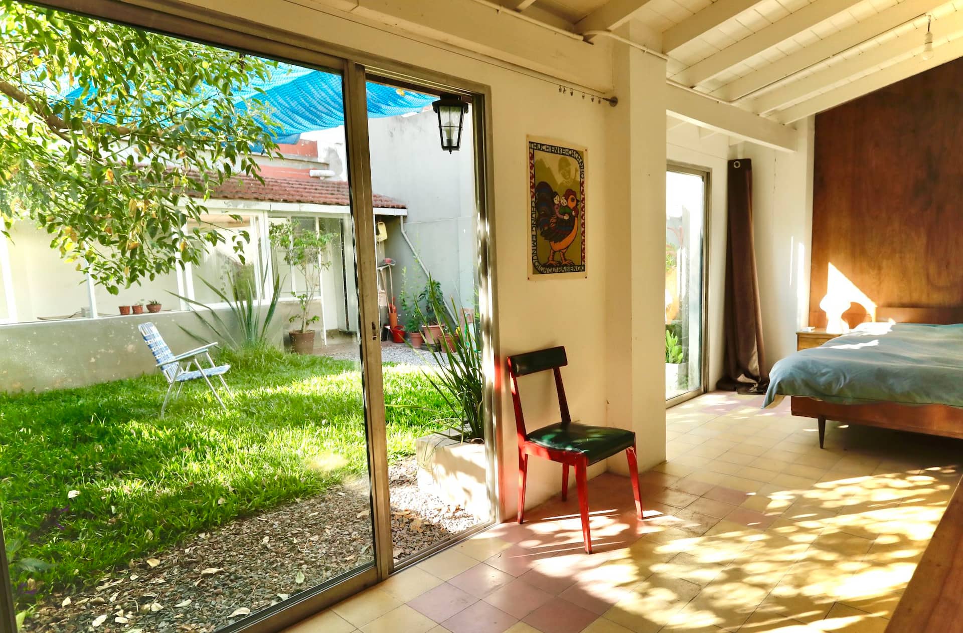 Room with a private bathroom next to a garden