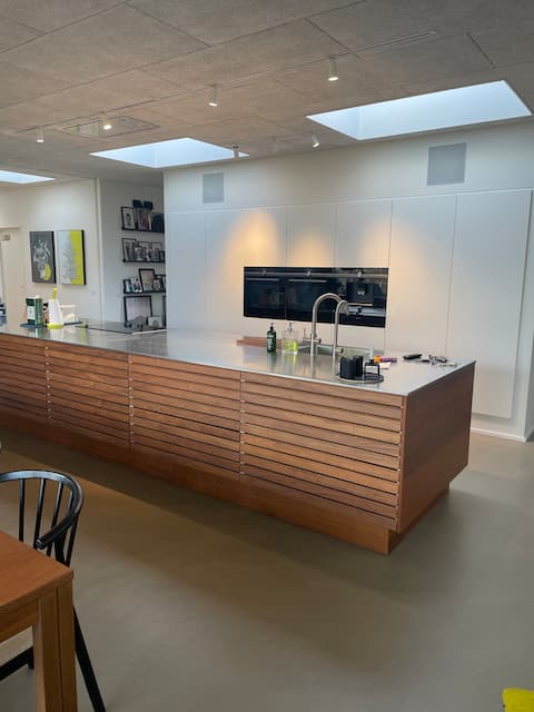 Modern house in nature area and view of forest