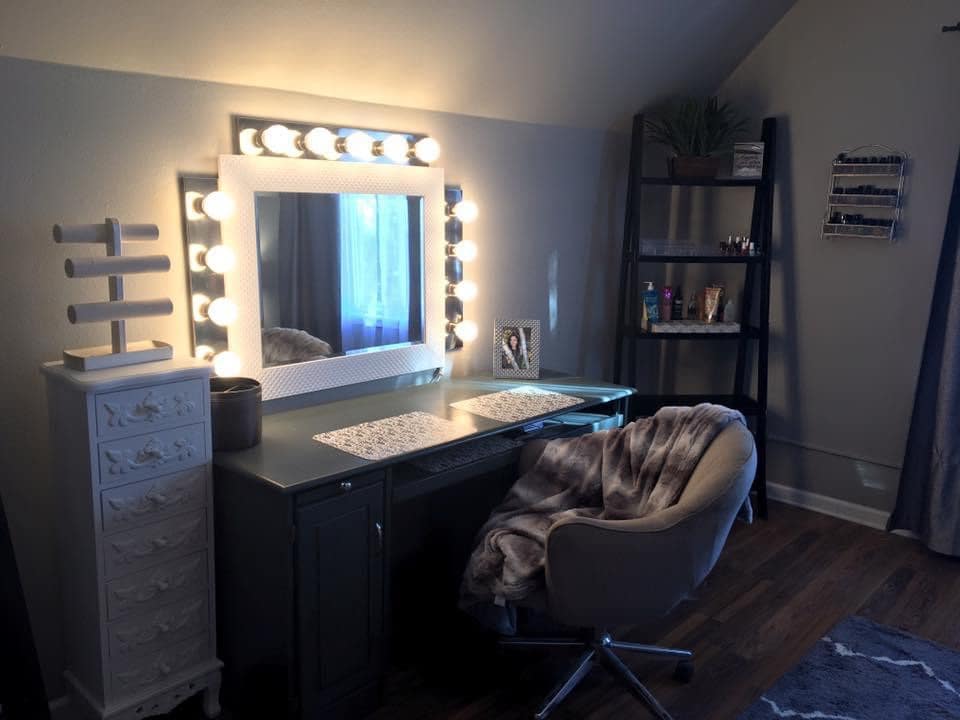 Second bedroom upstairs with queen bed, pull out twin sofa, and lighted mirror with vanity. 