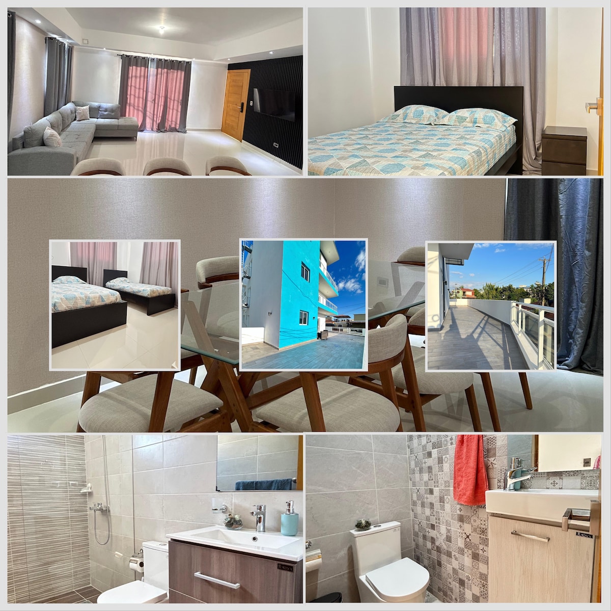 A living area features comfortable seating options arranged near large windows dressed with sheer curtains. A well-lit sleeping area showcases a spacious bed with patterned bedding. An outdoor terrace is visible, accompanied by a clear blue sky and greenery.