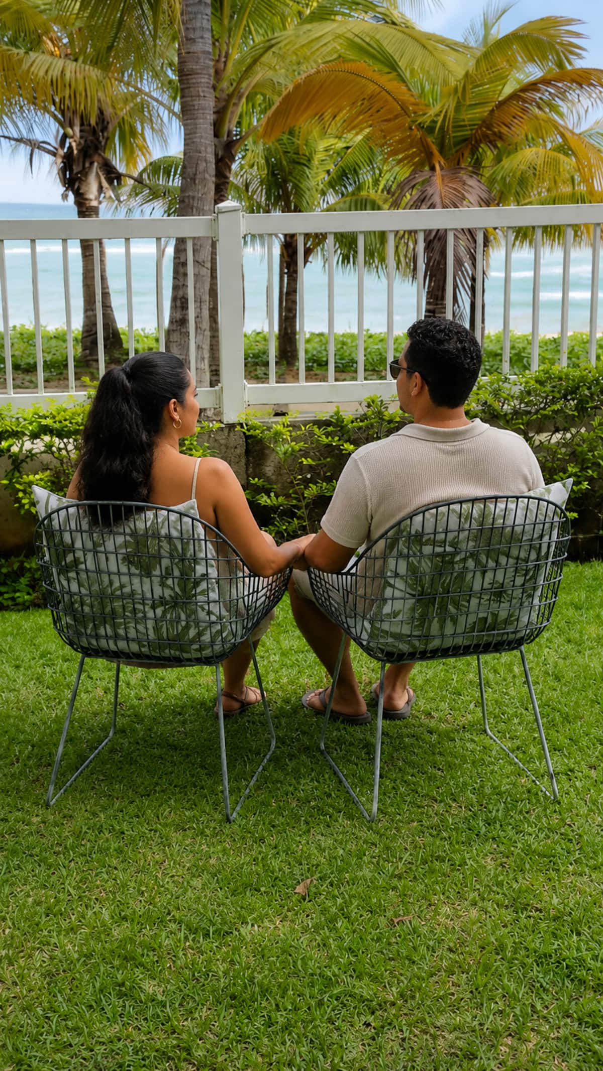Guests relaxing while watching Pacific Ocean waves