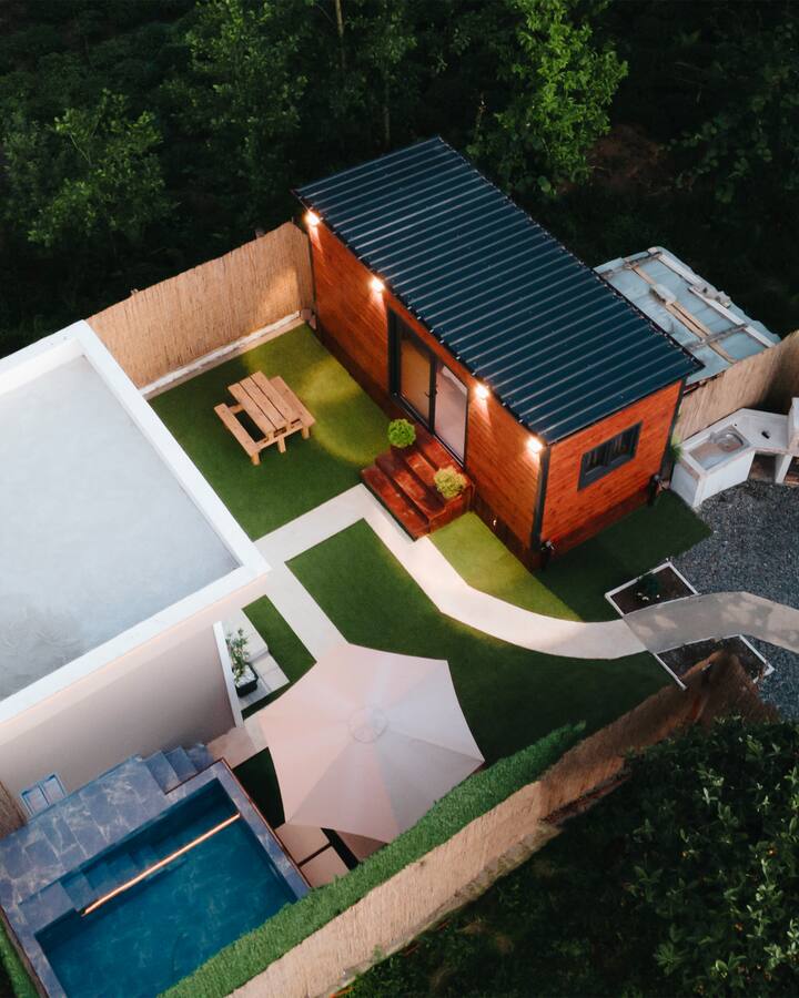 Wooden house with pool and large garden