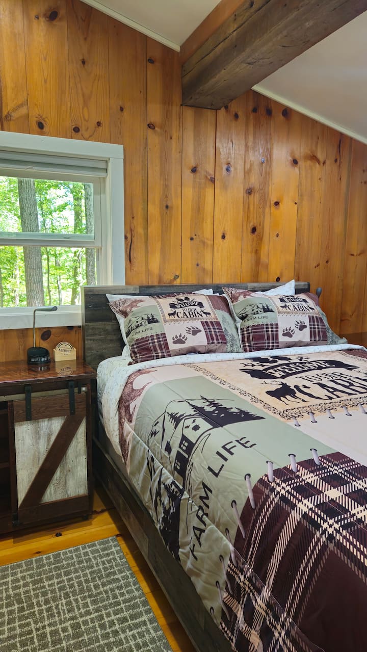 New mattress, memory foam topper &  bedding on the queen size bed in primary bedroom.  Pull down the blackout shades if you feel like sleeping in or wake up to a lakeview. Deer are often spotted out the bedroom windows. 
