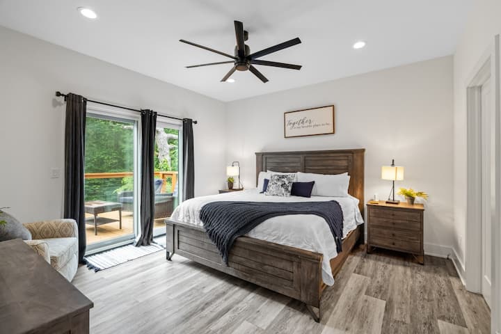 Wake to treetop views in this restful, light-filled bedroom.