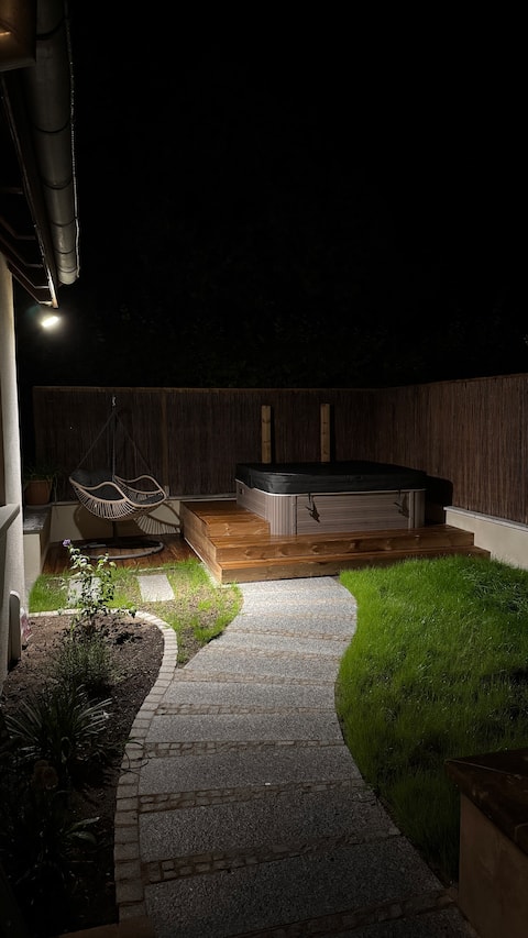 Cottage with cozy terrace and private hot tub