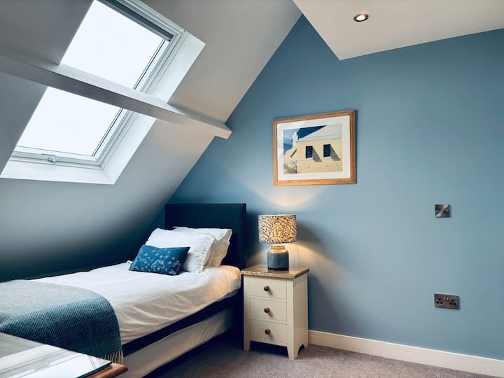 Bedroom 3, bright bedroom with the option of one or two single beds.