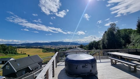 Panoramic views, large veranda, and hot tub