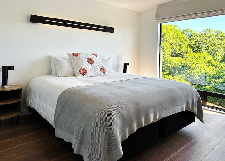 Bedroom 2: We call this room the Green Room. Total immersion in the canopy of the trees for stunning birdsong and sunsets. Super-king, super comfortable.