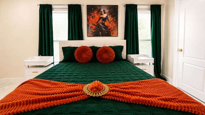 Wake up refreshed in this beautifully designed Queen suite featuring luxury linens, blackout curtains, comfortable pillows, and a peaceful atmosphere ideal for business or leisure travelers.