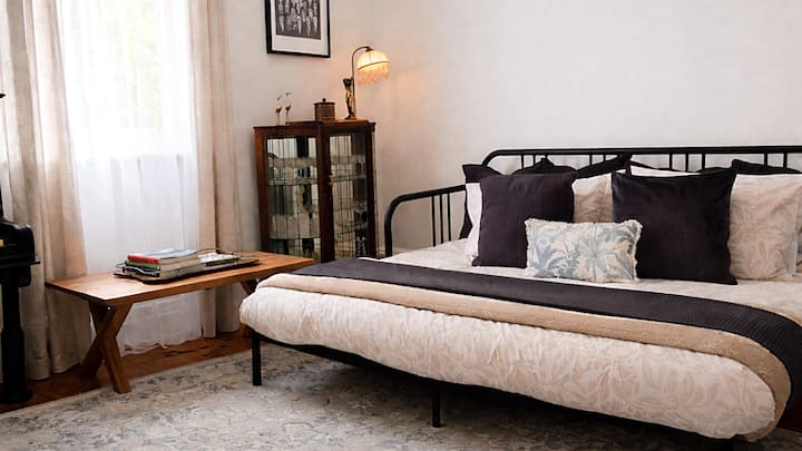 The Daybed in the Parlour converts to a comfortable Queen Sized bed with quality sprung mattresses.