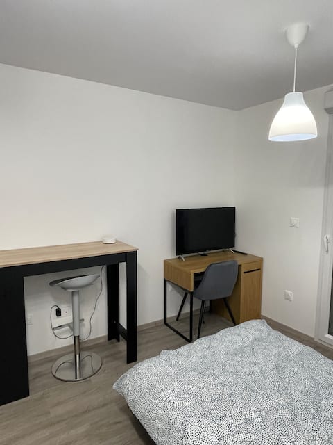 New studio with balcony and secure parking.
