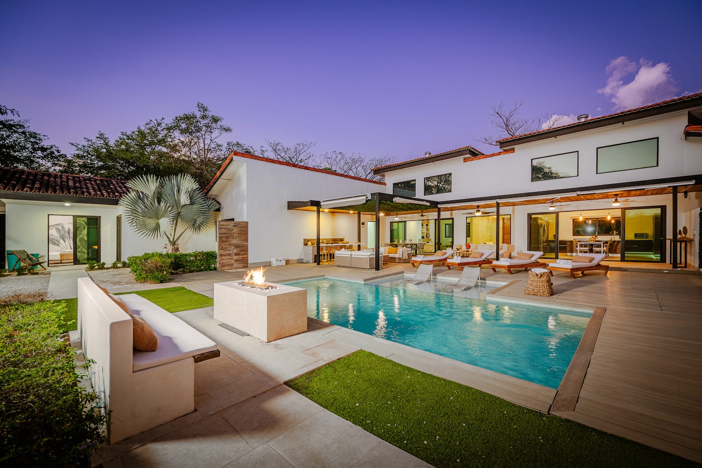 Villa NAUA’s courtyard pool at dusk