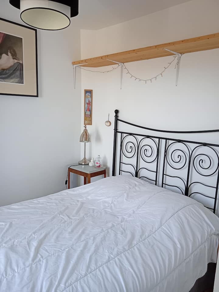 habitación cama doble.