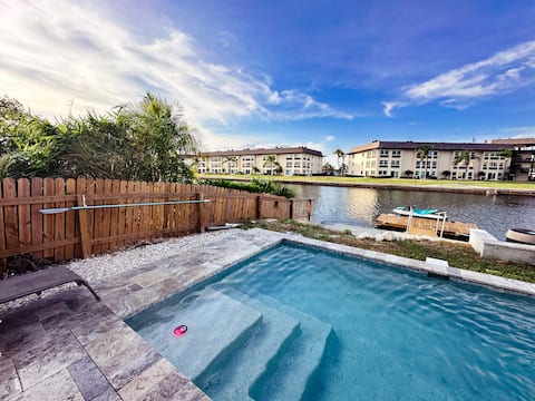 Dreamy Pink Villa | Waterfront Pool + Hot Tub