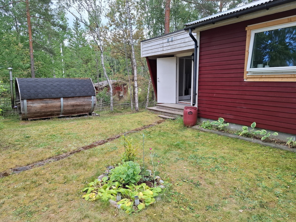 Cottage near the sea with large yard, sauna and fireplace.