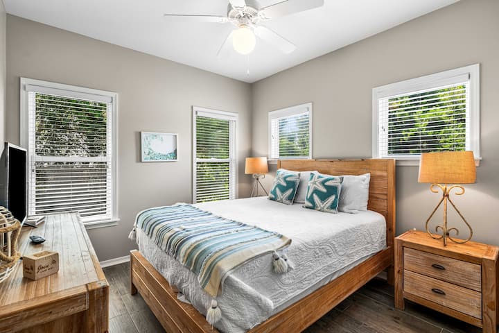 Our 2nd-floor guest bedroom features a queen bed, full closet, nightstands, USB charging block, and a new Smart TV so you can stream all your favorite shows after a day at the beach.