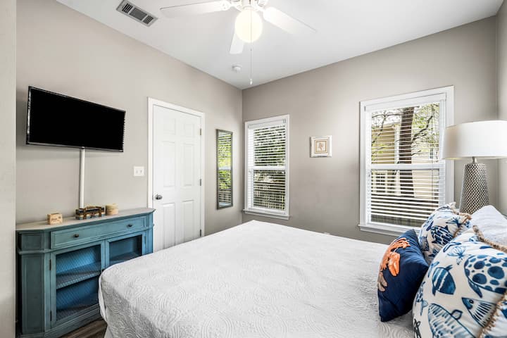 Our 1st-floor guest bedroom features a queen bed, two nightstands, a full closet, USB charging block, and a new Smart TV so you can stream all your favorite shows after a long day at the beach.  
