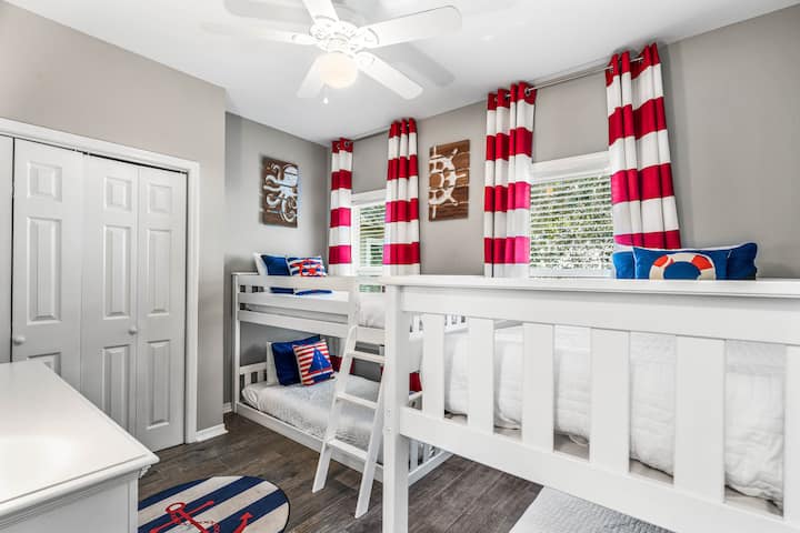 Our 2nd-floor bunk room features 2x sets of bunk beds (each bed is a twin), a full closet, a dresser, a new Smart TV, and an Xbox-One gaming system so the kids can relax and have fun after a day at the beach. 
