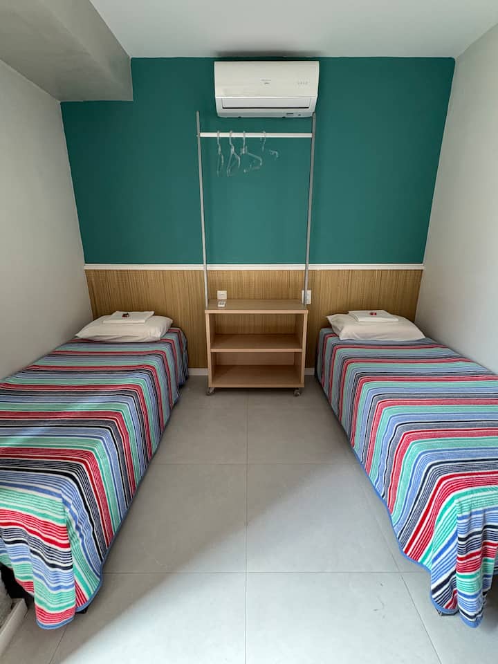 Bedroom 2 - with air conditioning, 2 single beds and 1 bunk bed (sleeps up to 4 people)
The room has a door to a small balcony, shared with room 1

(ask about single beds and/or bunk beds)