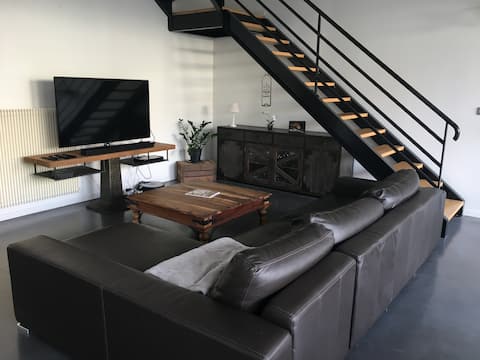 Successful Airbnb property: Loft with hot tub and cinema room in Roanne