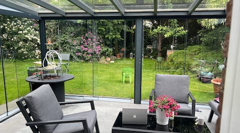 House with conservatory and fireplace