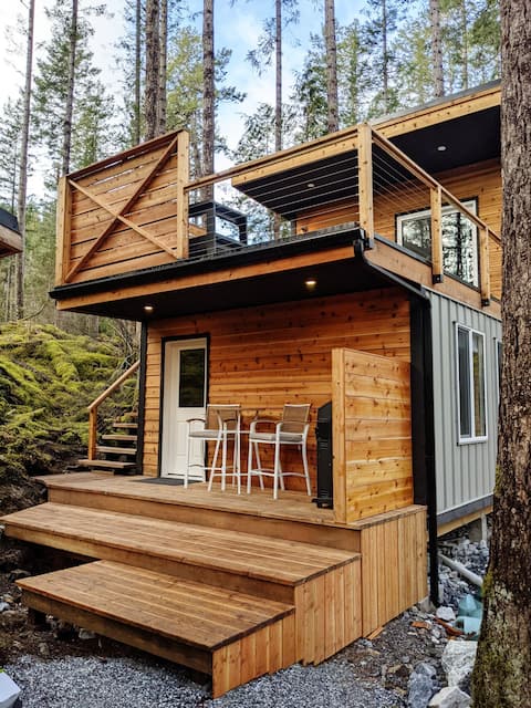 Rooftop cottage in forest spa