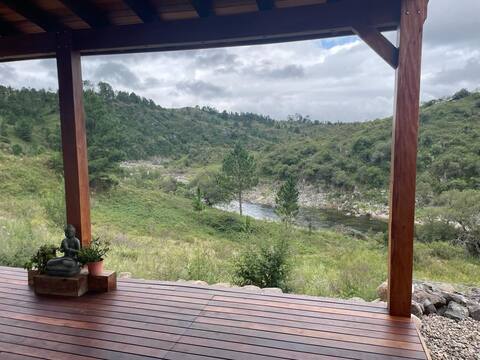 Riverfront house in the mountains