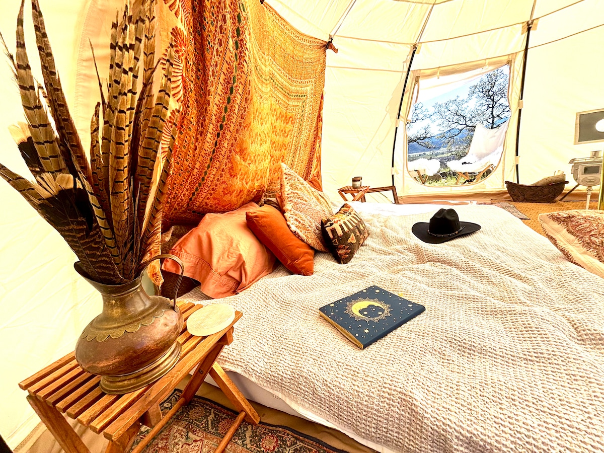 The bohemian decor is typical for Lake County, which has had yoga ashrams since the 1960s. Furniture includes vintage Indian tapestries, pheasant and wild turkey feathers from loca