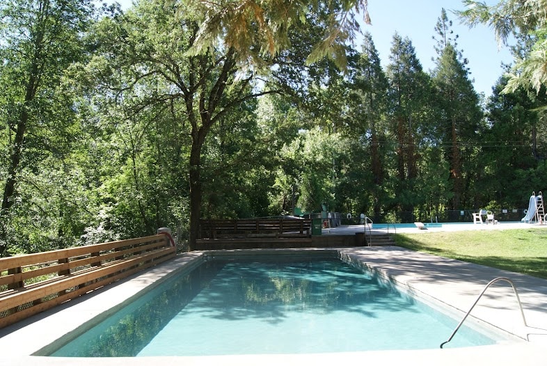 Beautiful Pine Grove spring fed pool, $13. Organic poolside cafe. at Stargazing Dome in Hidden Valley Lake