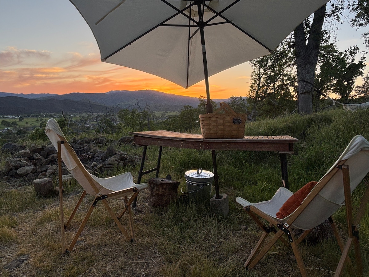 May: You can bring your chairs and table outside to enjoy the panoramic view. at Stargazing Dome in Hidden Valley Lake