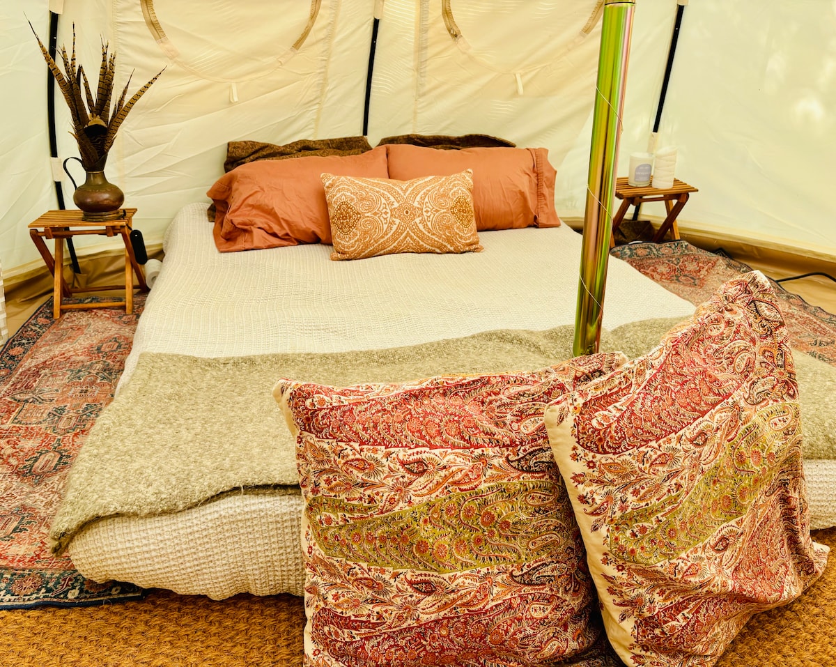 The most comfortable camping ever! Memory foam firm queen charcoal bamboo mattress, electric dual heated mattress pad, cotton sheets, down duvet, Pottery Barn cushions, vintage tou