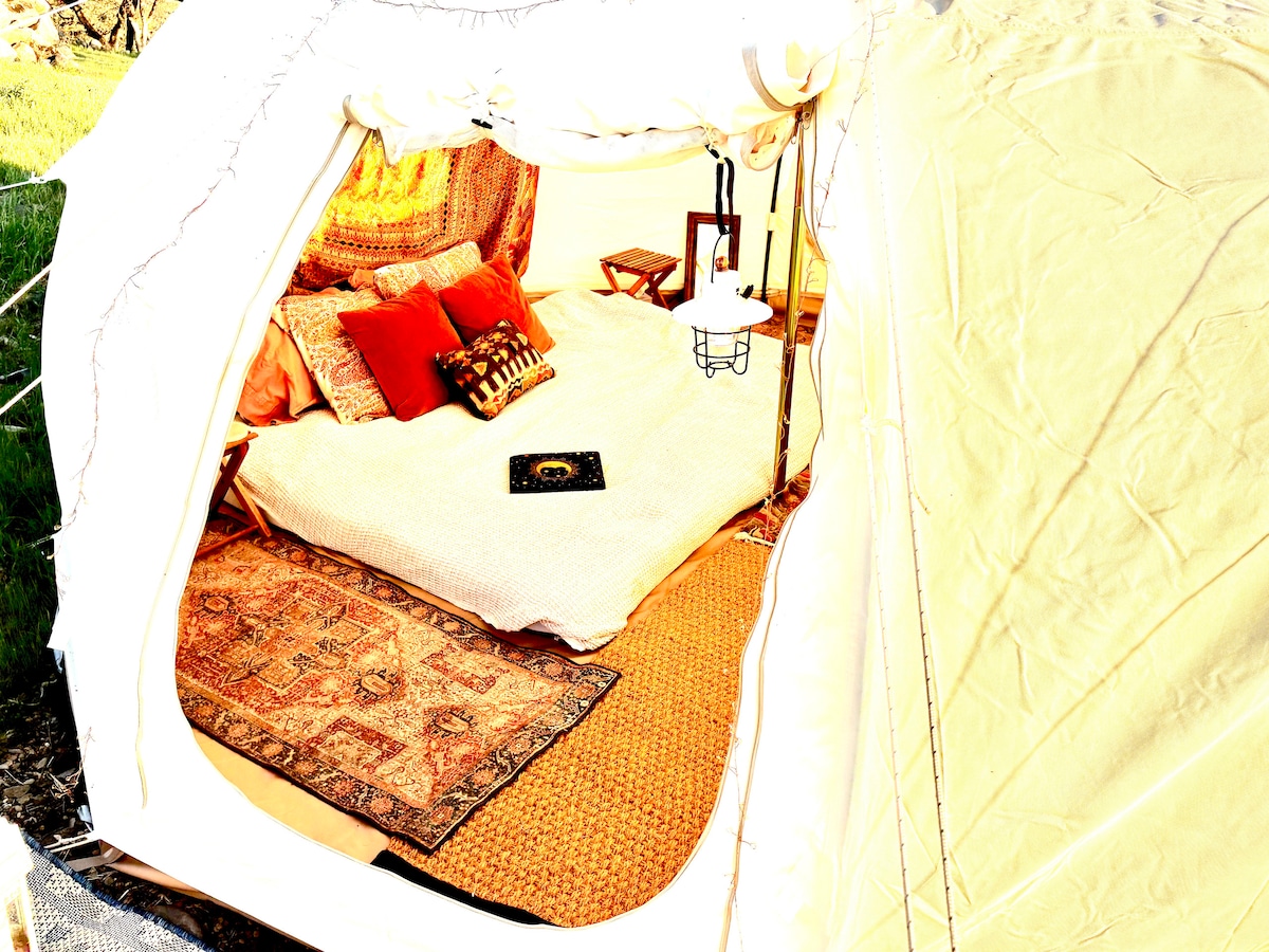 Peeking in though the doorway. The sisal carpeting is custom from Life in Tents, made of natural coconut coir. Guests are expected to respect these fine things with our "SHOES OFF"