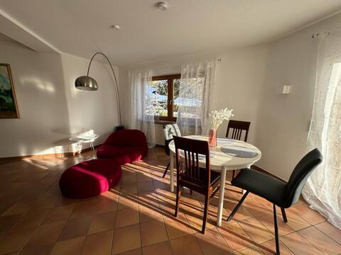 Bright terrace apartment surrounded by greenery